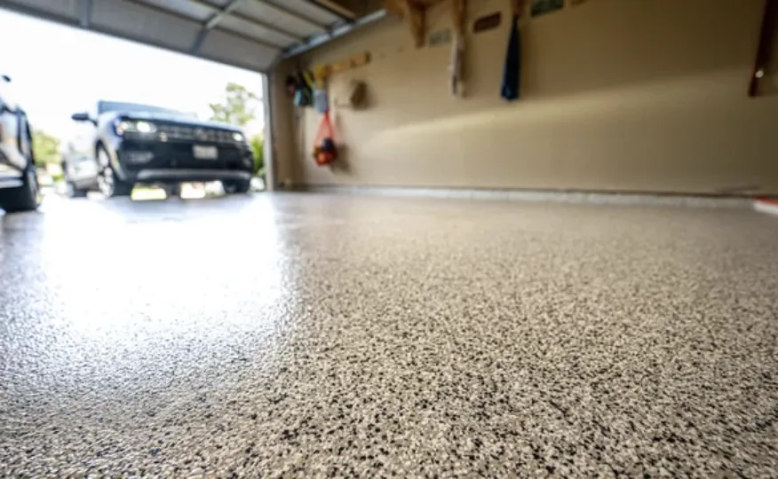 Flake epoxy garage floor with a high-end car in Lehi